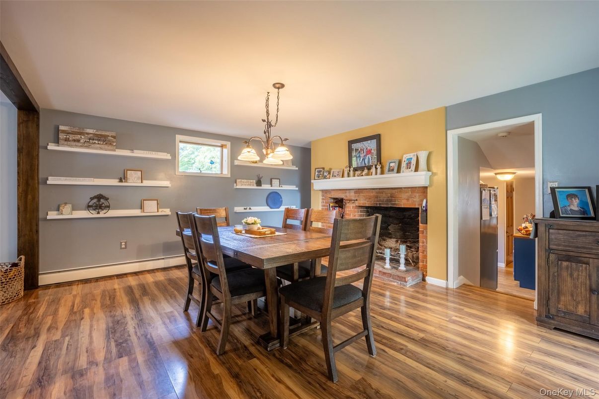 Dining room, Fireplace, Interior, Pendant Lights, Wood Texture Flooring