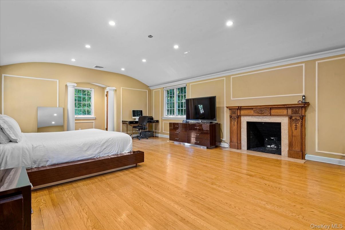 Bedroom, Fireplace, Interior, Recessed Lighting, Wood Texture Flooring