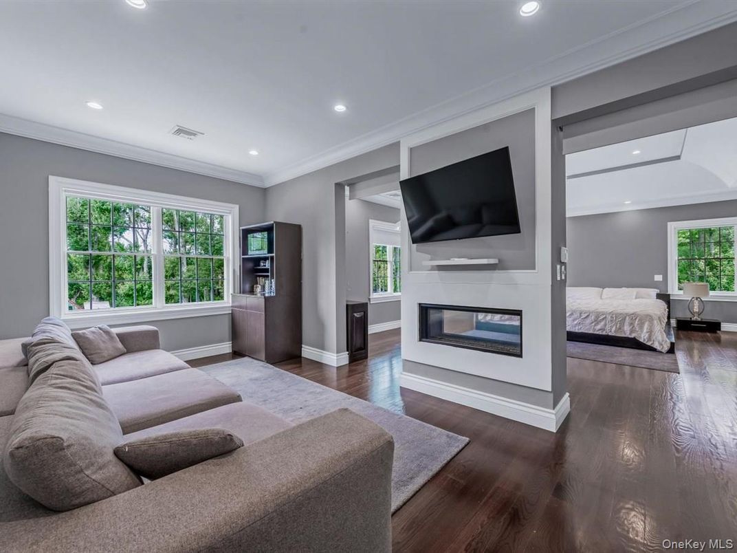 Bedroom, Fireplace, Interior, Living room, Recessed Lighting, Wood Texture Flooring