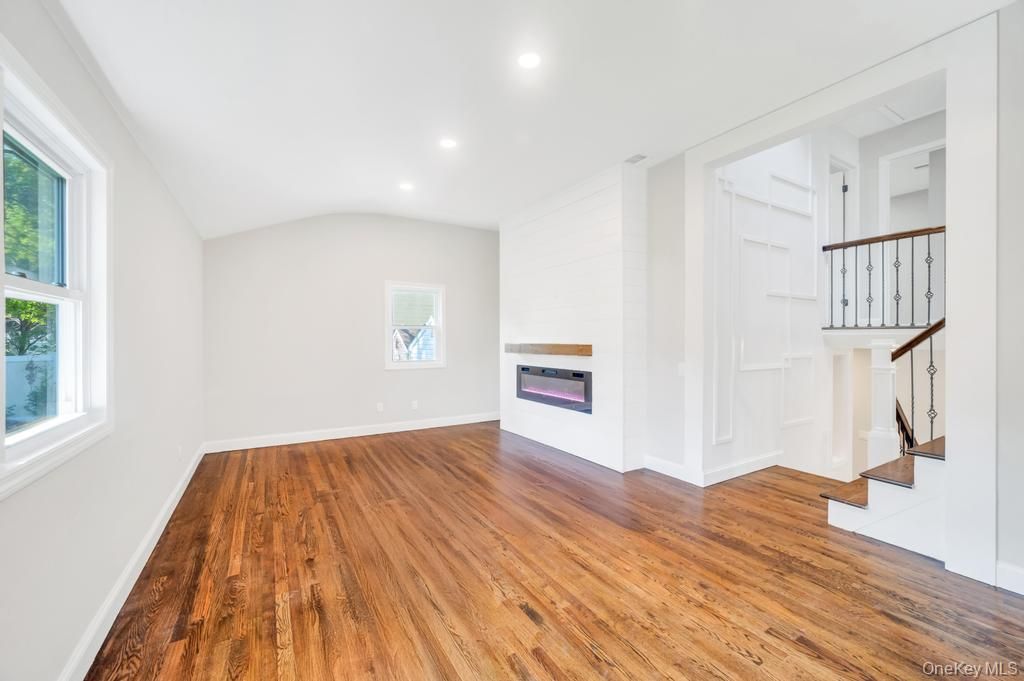 Empty room, Fireplace, Interior, Recessed Lighting, Wood Texture Flooring