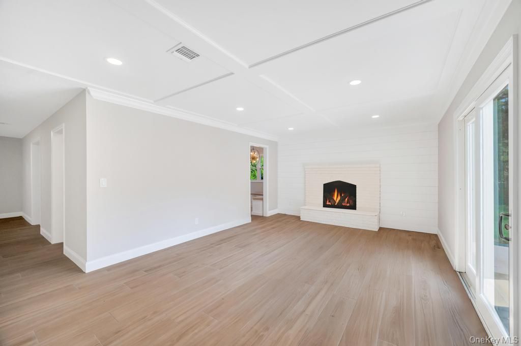 Empty room, Fireplace, Interior, Recessed Lighting, Wood Texture Flooring