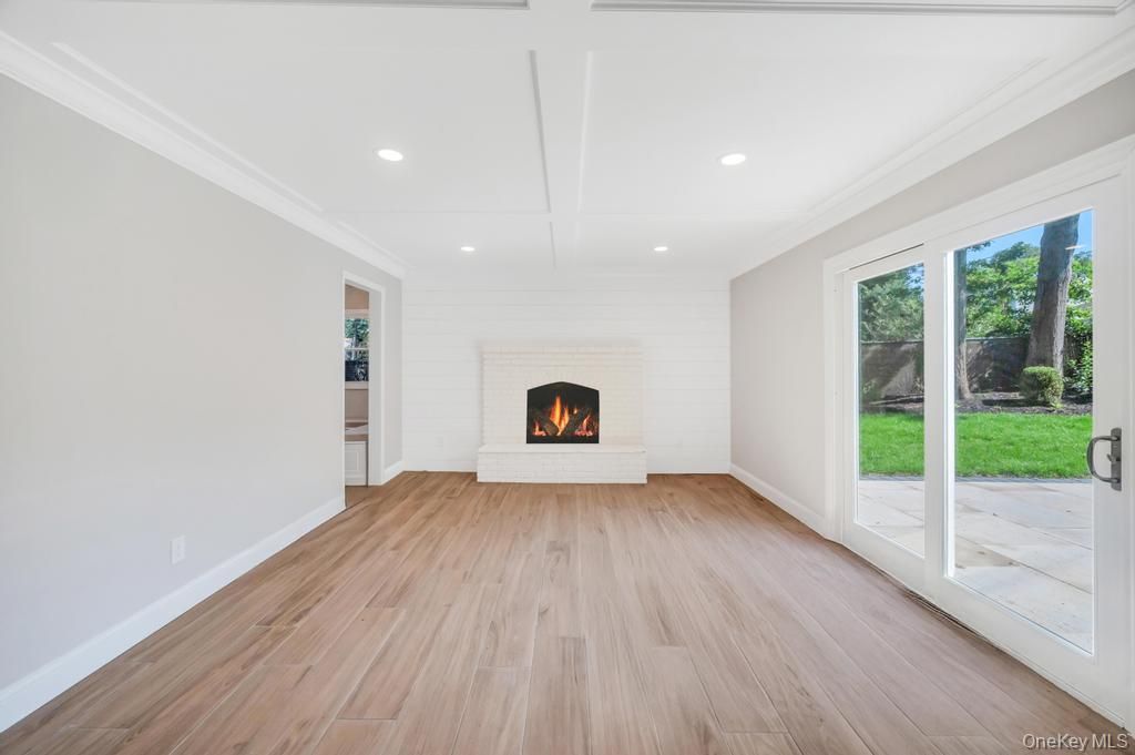 Empty room, Fireplace, Interior, Recessed Lighting, Wood Texture Flooring