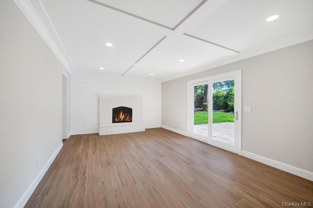 Empty room, Fireplace, Interior, Recessed Lighting, Wood Texture Flooring