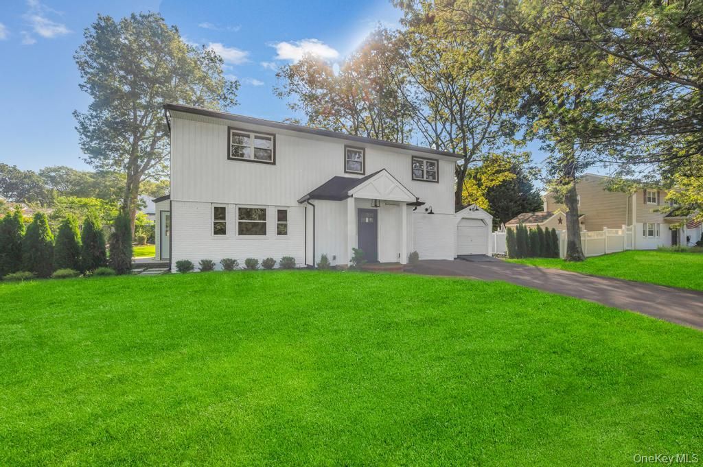 Attached, Backyard, Exterior, Facade, Raised Ranch