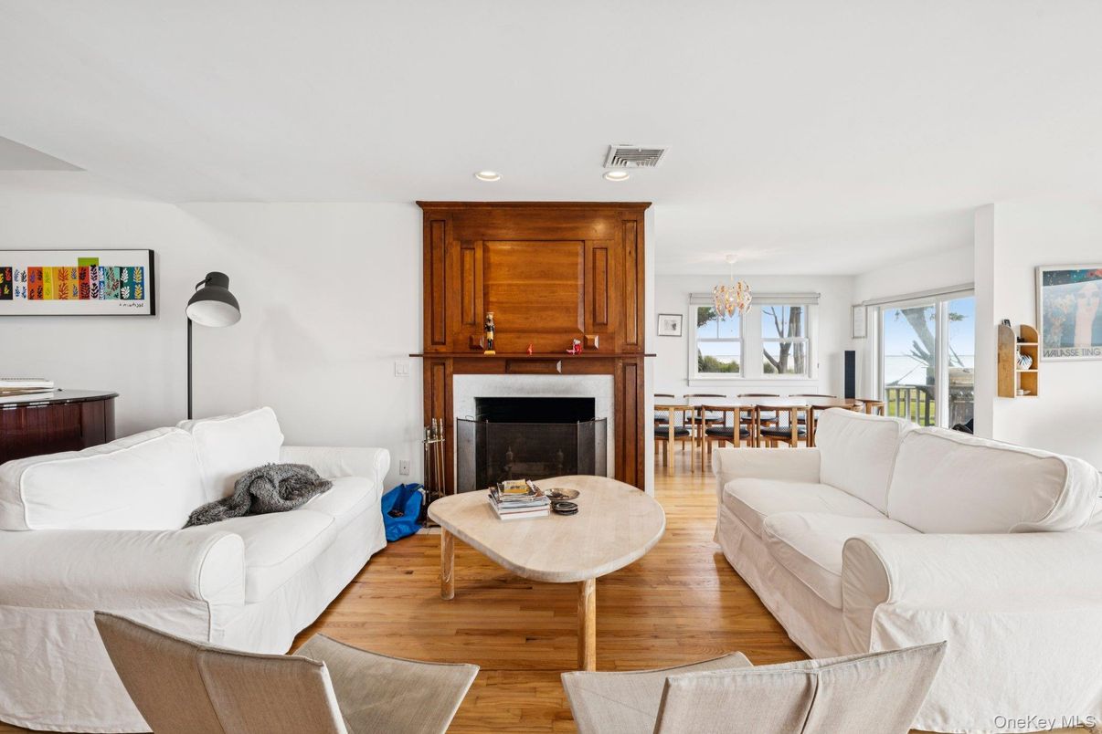 Chandelier, Dining room, Fireplace, Interior, Living room, Recessed Lighting, Wood Texture Flooring