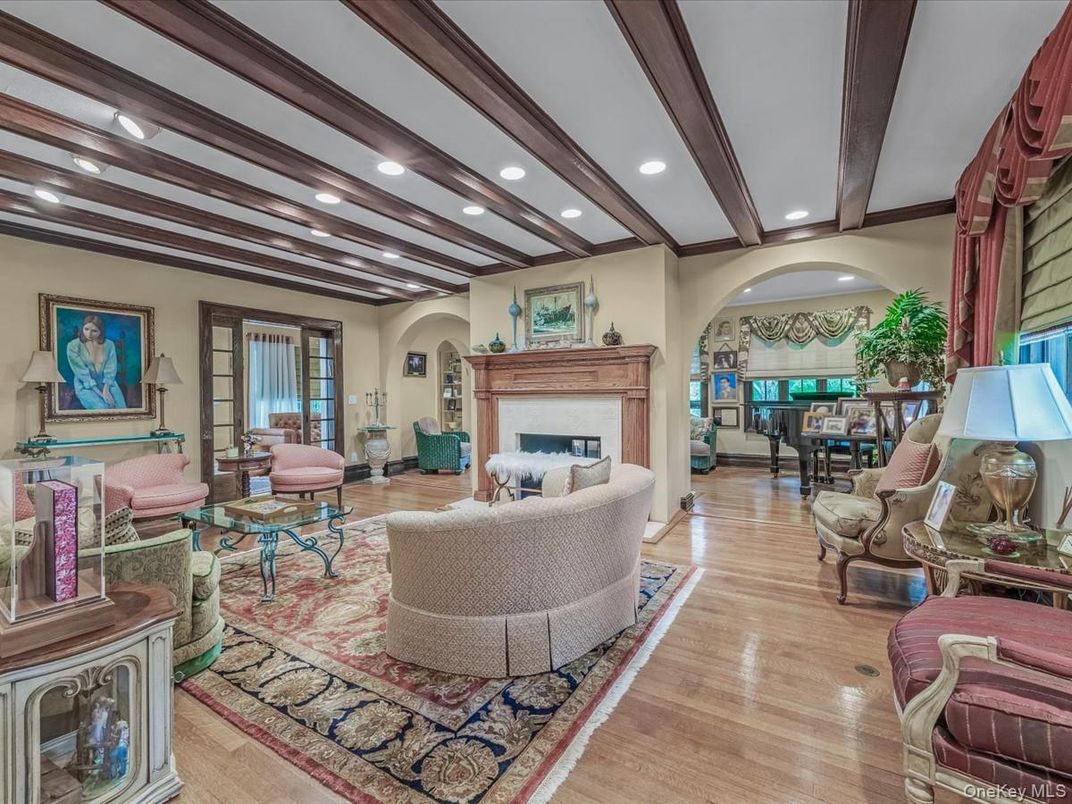 Fireplace, Interior, Living room, Piano, Recessed Lighting, Wooden Beams, Wood Texture Flooring