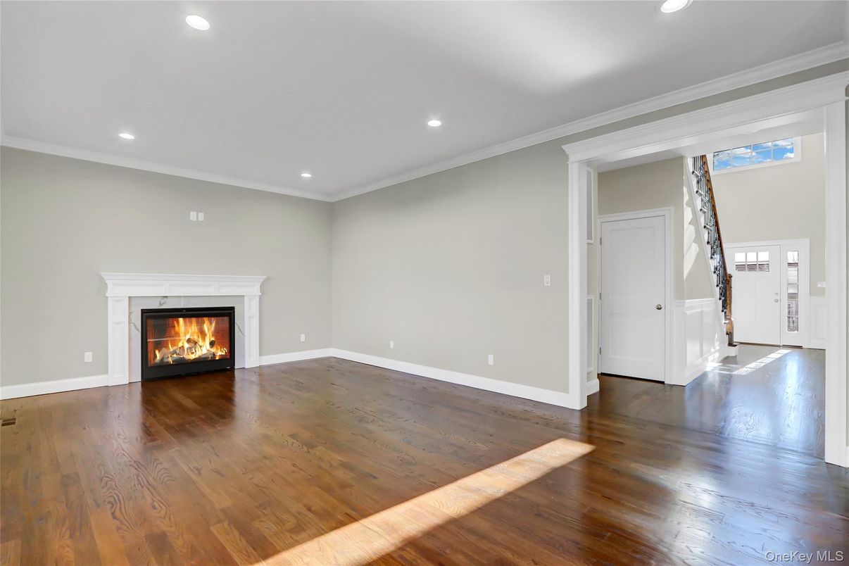 Empty room, Fireplace, Interior, Recessed Lighting, Wood Texture Flooring
