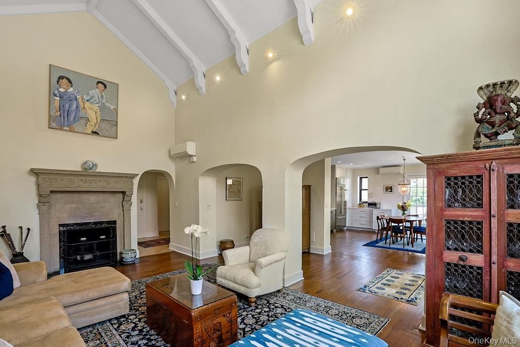 Dining room, Fireplace, Interior, Living room, Pendant Lights, Recessed Lighting, Wood Texture Flooring