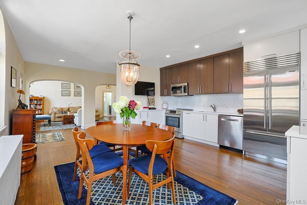 Dining room, Interior, Kitchen, Living room, Pendant Lights, Recessed Lighting, Stainless Steel Appliances, Wood Texture Flooring