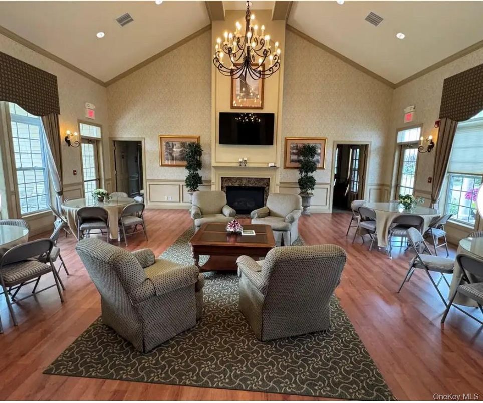Chandelier, Dining room, Fireplace, Interior, Living room, Recessed Lighting, Wood Texture Flooring