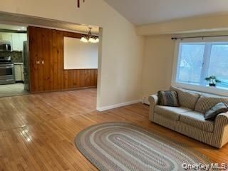 Chandelier, Empty room, Interior, Kitchen, Living room, Stainless Steel Appliances, Wood Texture Flooring