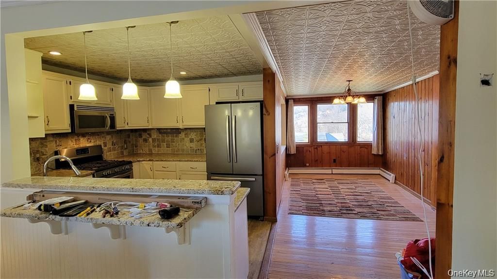 Chandelier, Interior, Kitchen, Pendant Lights, Recessed Lighting, Stainless Steel Appliances, Wood Texture Flooring