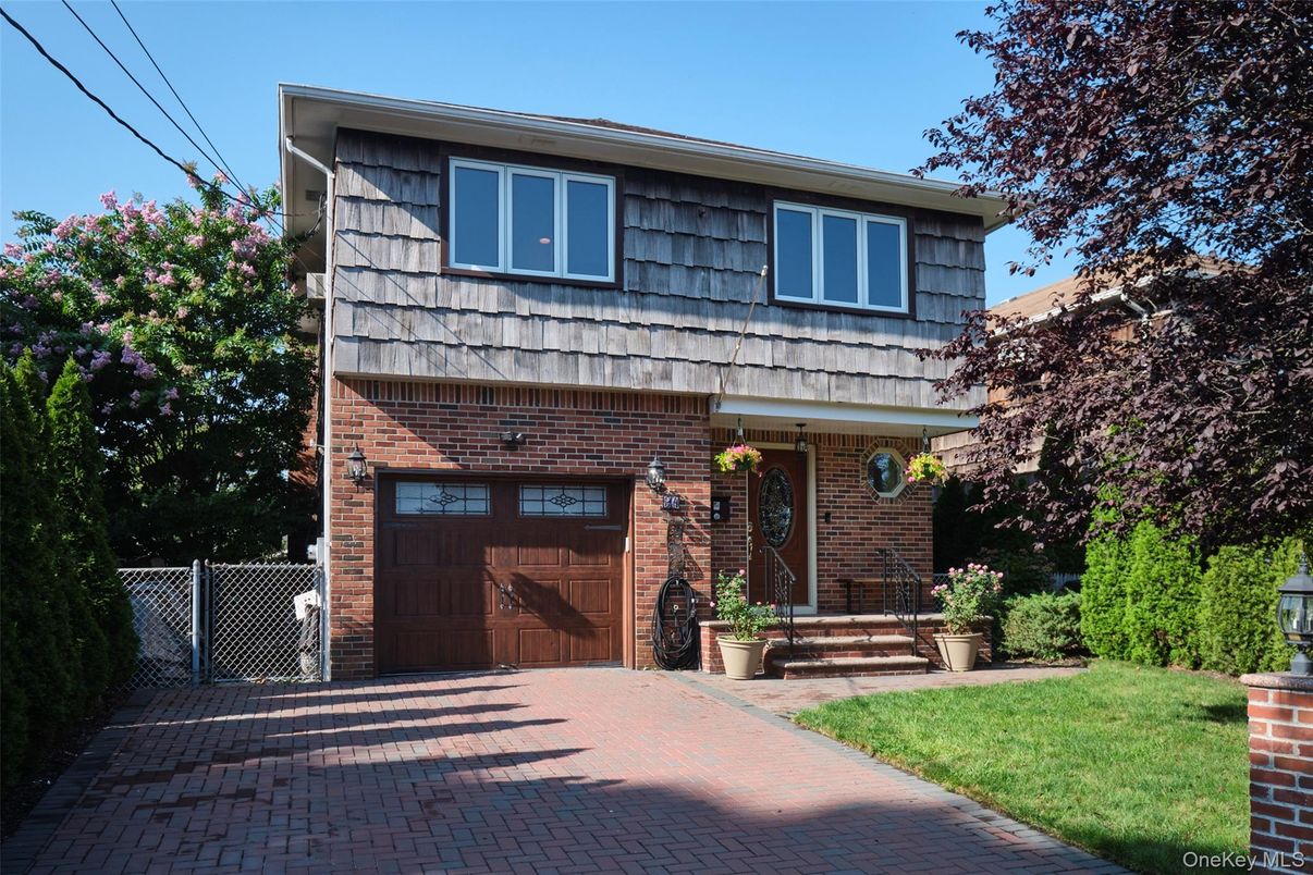 Attached, Exterior, Facade, Brick Facade, Raised Ranch