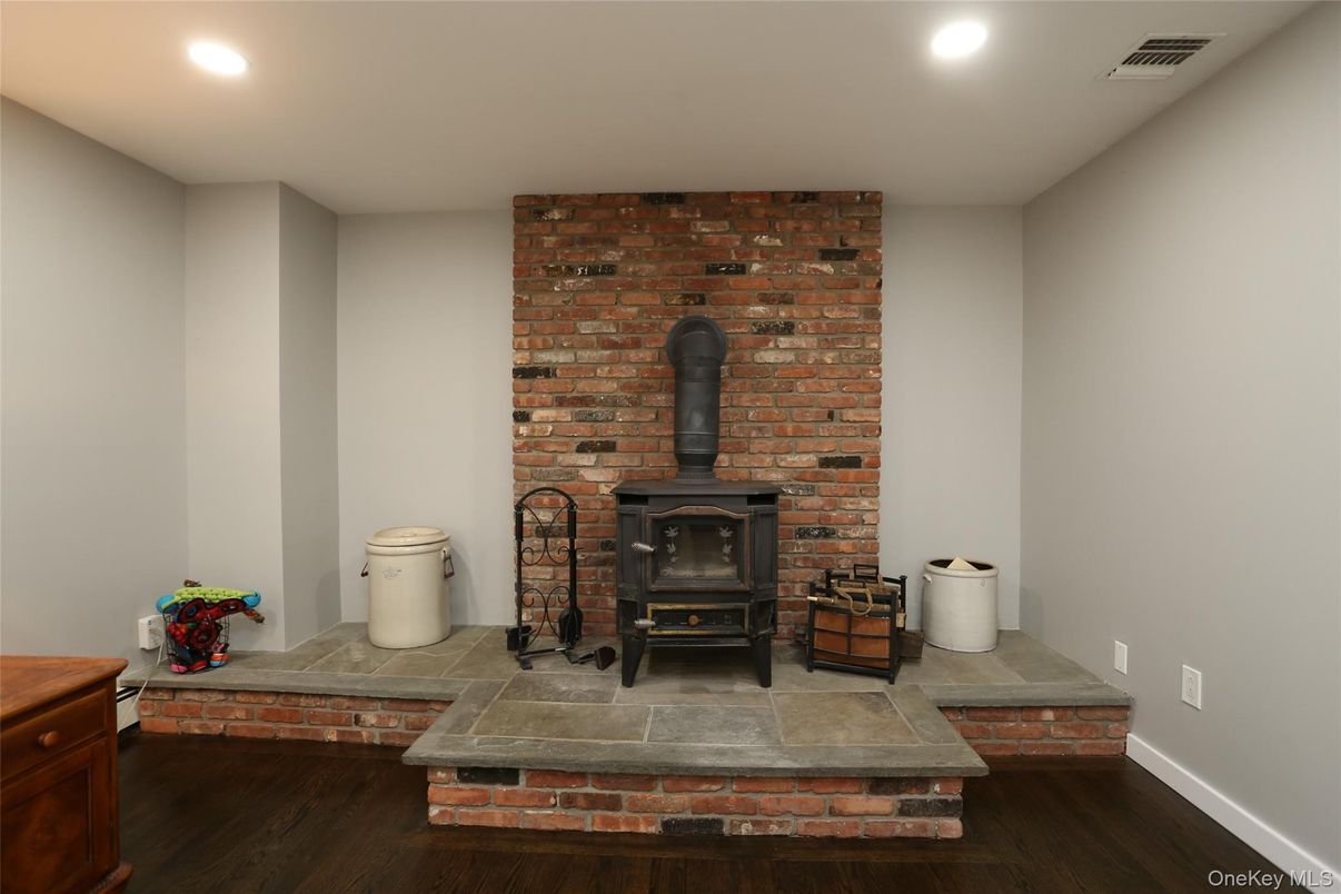 Fireplace, Interior, Recessed Lighting, Stone Walls, Wood Texture Flooring