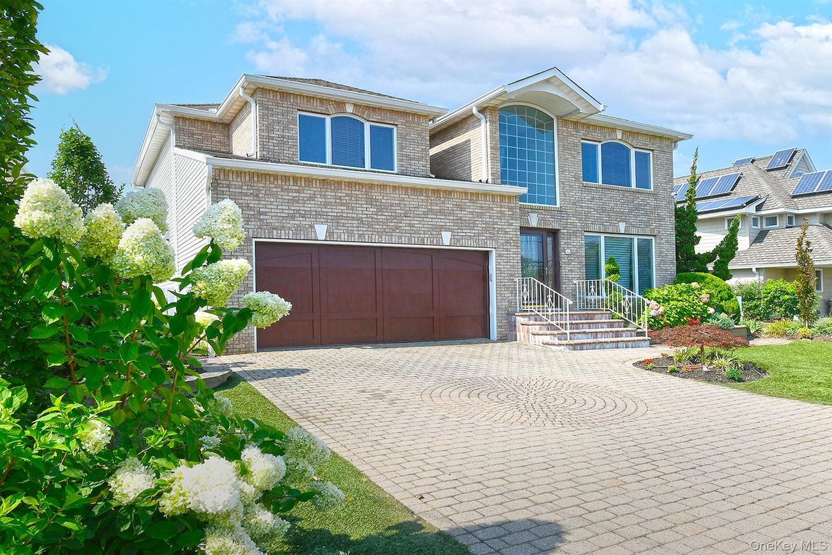 Attached, Exterior, Facade, Brick Facade, Solar Panels, Brick Traditional