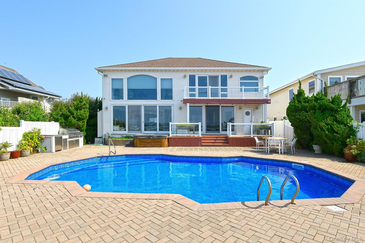 Exterior, Pool, Solar Panels