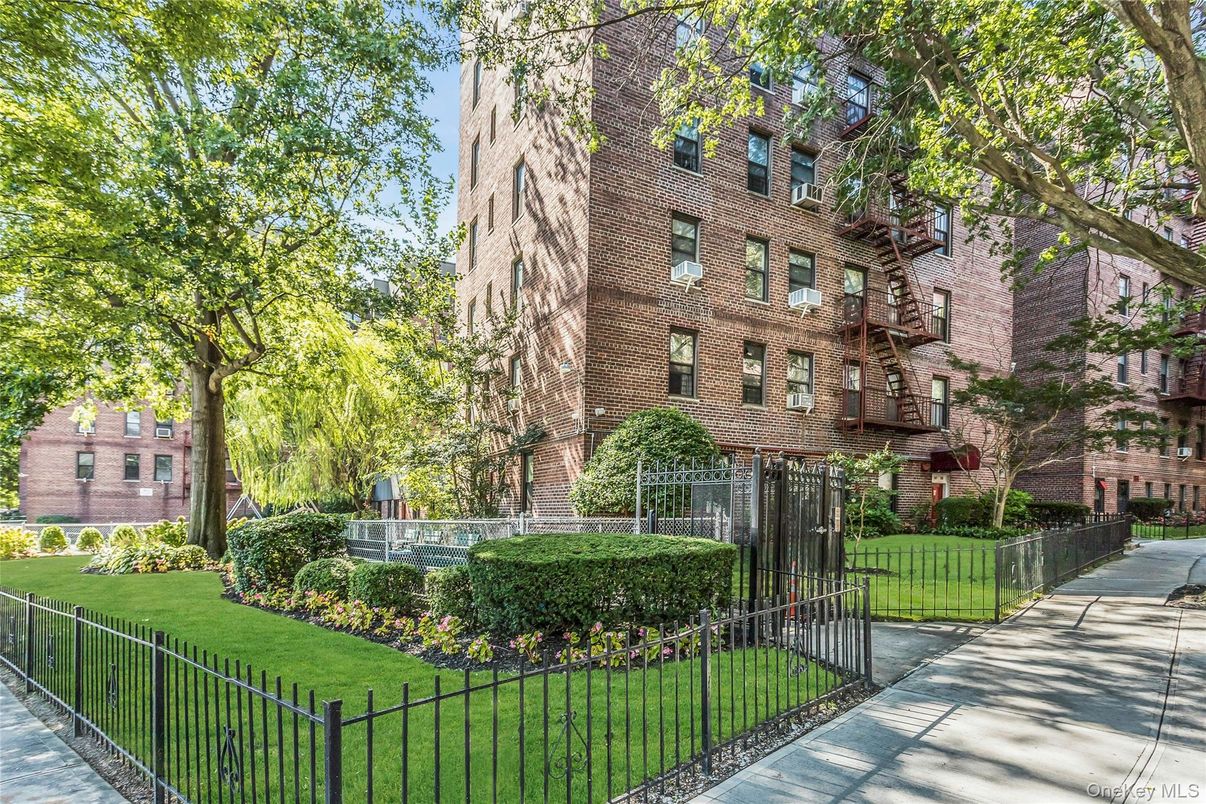Exterior, Facade, Brick Facade, Condo Building
