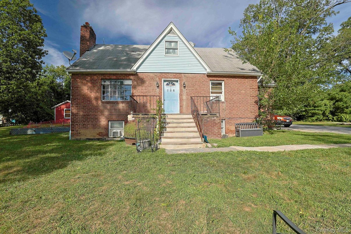 Exterior, Facade, Brick Facade, Cape Cod