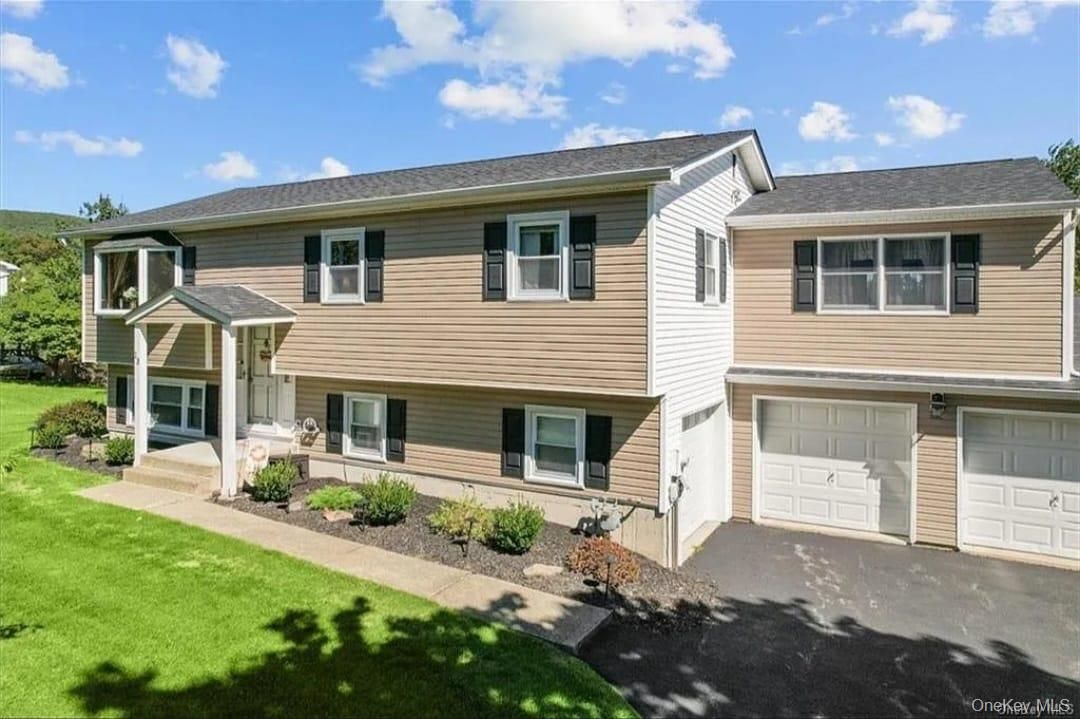 Attached, Exterior, Facade, Raised Ranch
