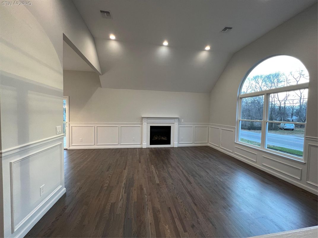 Empty room, Fireplace, Interior, Recessed Lighting, Wood Texture Flooring