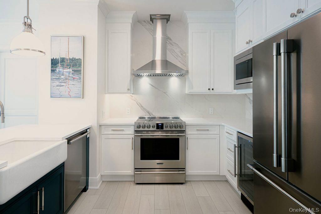Interior, Kitchen, Marble Walls, Pendant Lights, Stainless Steel Appliances, Wood Texture Flooring