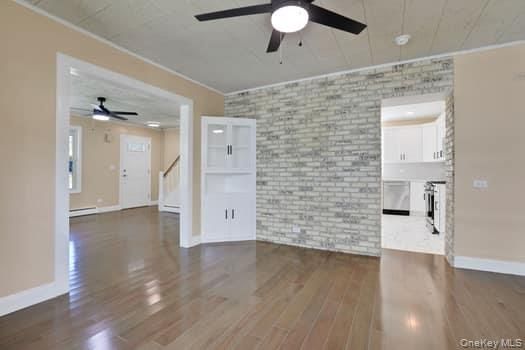 Empty room, Interior, Kitchen, Recessed Lighting, Stone Walls, Wood Texture Flooring