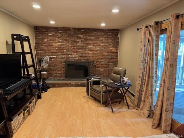 Fireplace, Fitness Equipment, Interior, Recessed Lighting, Stone Walls, Wood Texture Flooring