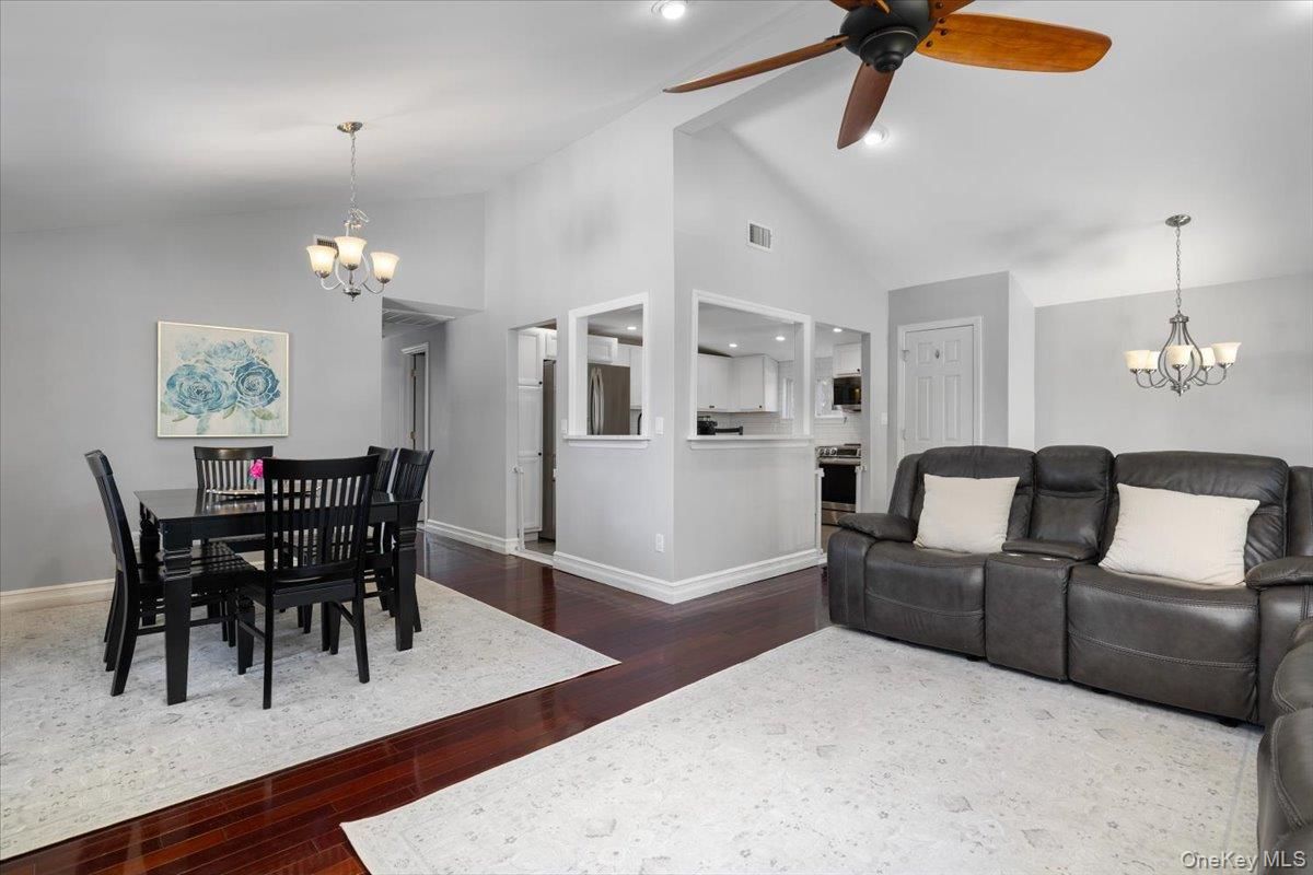 Chandelier, Dining room, Interior, Kitchen, Recessed Lighting, Stainless Steel Appliances, Wood Texture Flooring
