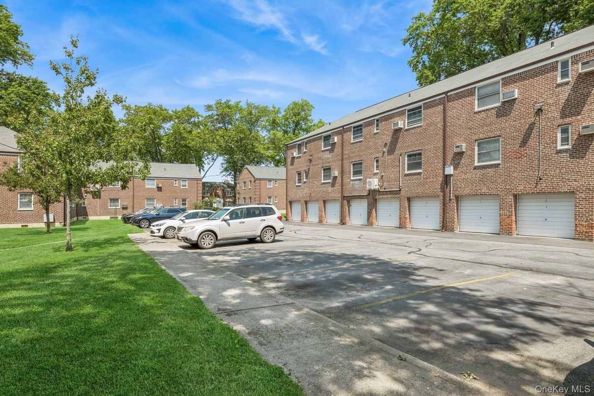 Attached, Exterior, Facade, Brick Facade, Condo Building