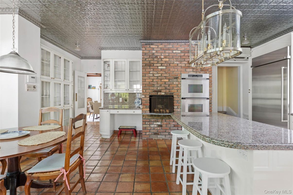 Dining room, Fireplace, Interior, Kitchen, Stainless Steel Appliances, Stone Walls