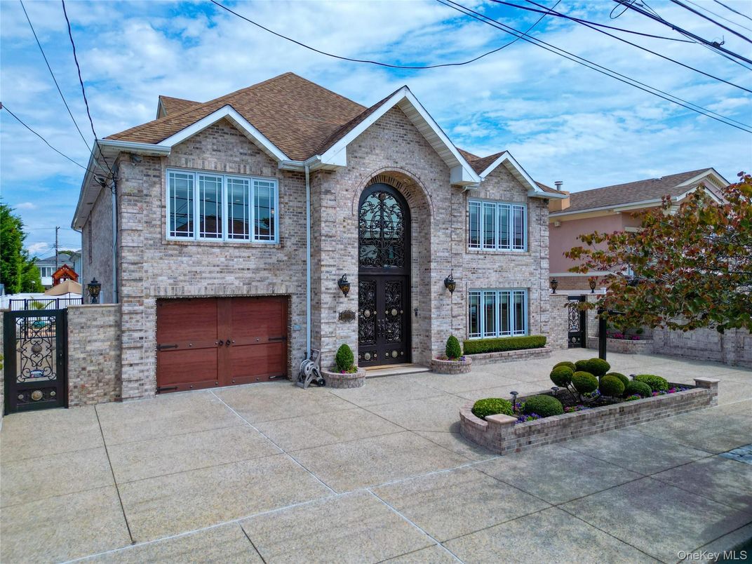Attached, Exterior, Facade, Brick Facade, Brick Traditional