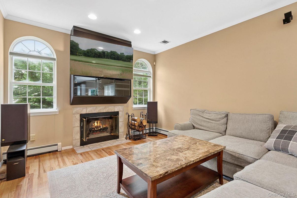 Fireplace, Interior, Living room, Recessed Lighting, Wood Texture Flooring