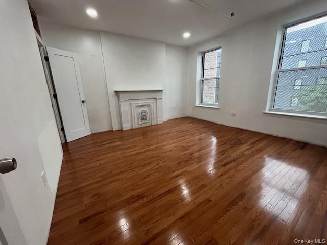 Empty room, Fireplace, Interior, Recessed Lighting, Wood Texture Flooring