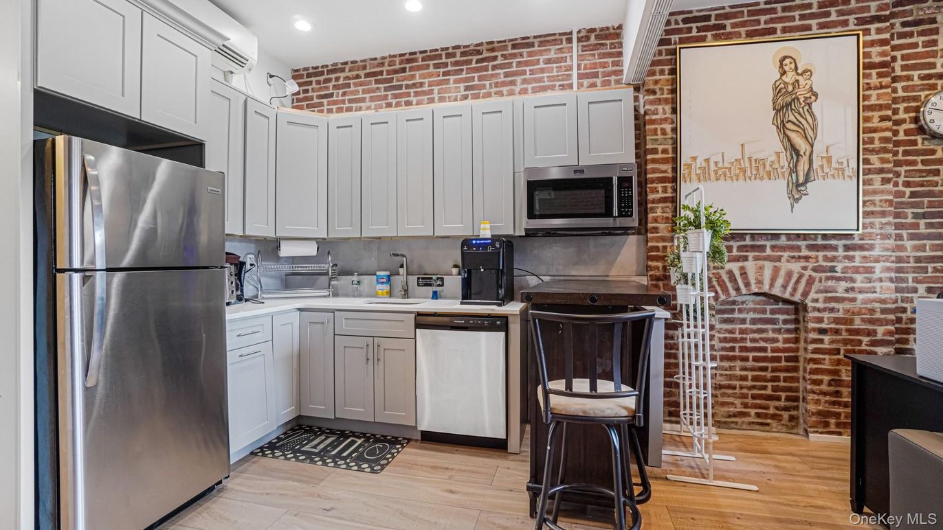 Interior, Kitchen, Recessed Lighting, Stainless Steel Appliances, Stone Walls, Wood Texture Flooring