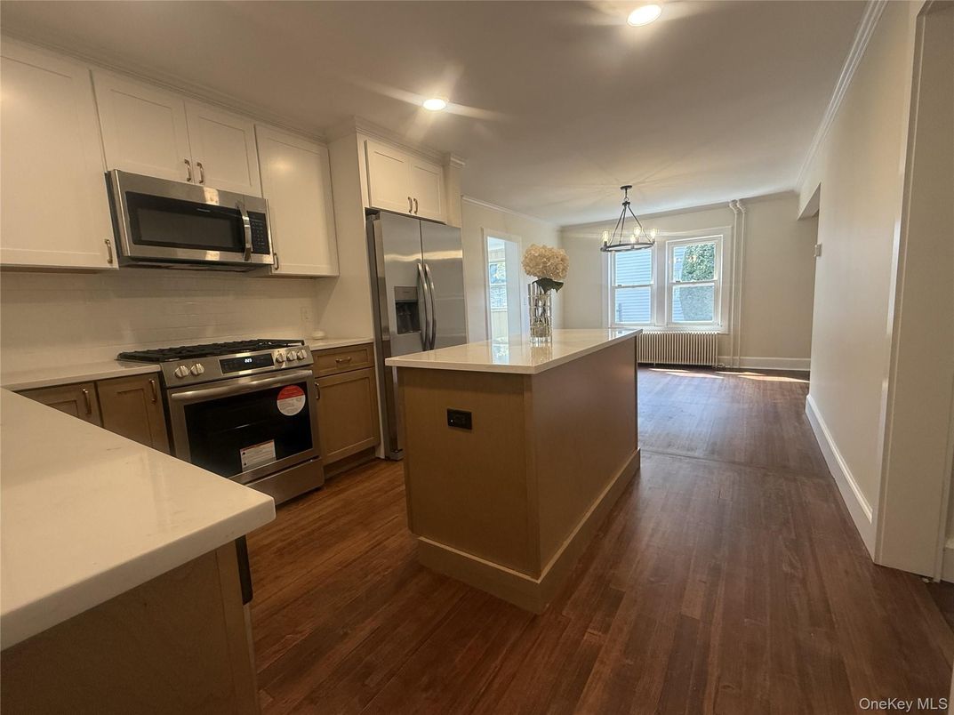 Chandelier, Interior, Kitchen, Pendant Lights, Recessed Lighting, Stainless Steel Appliances, Wood Texture Flooring