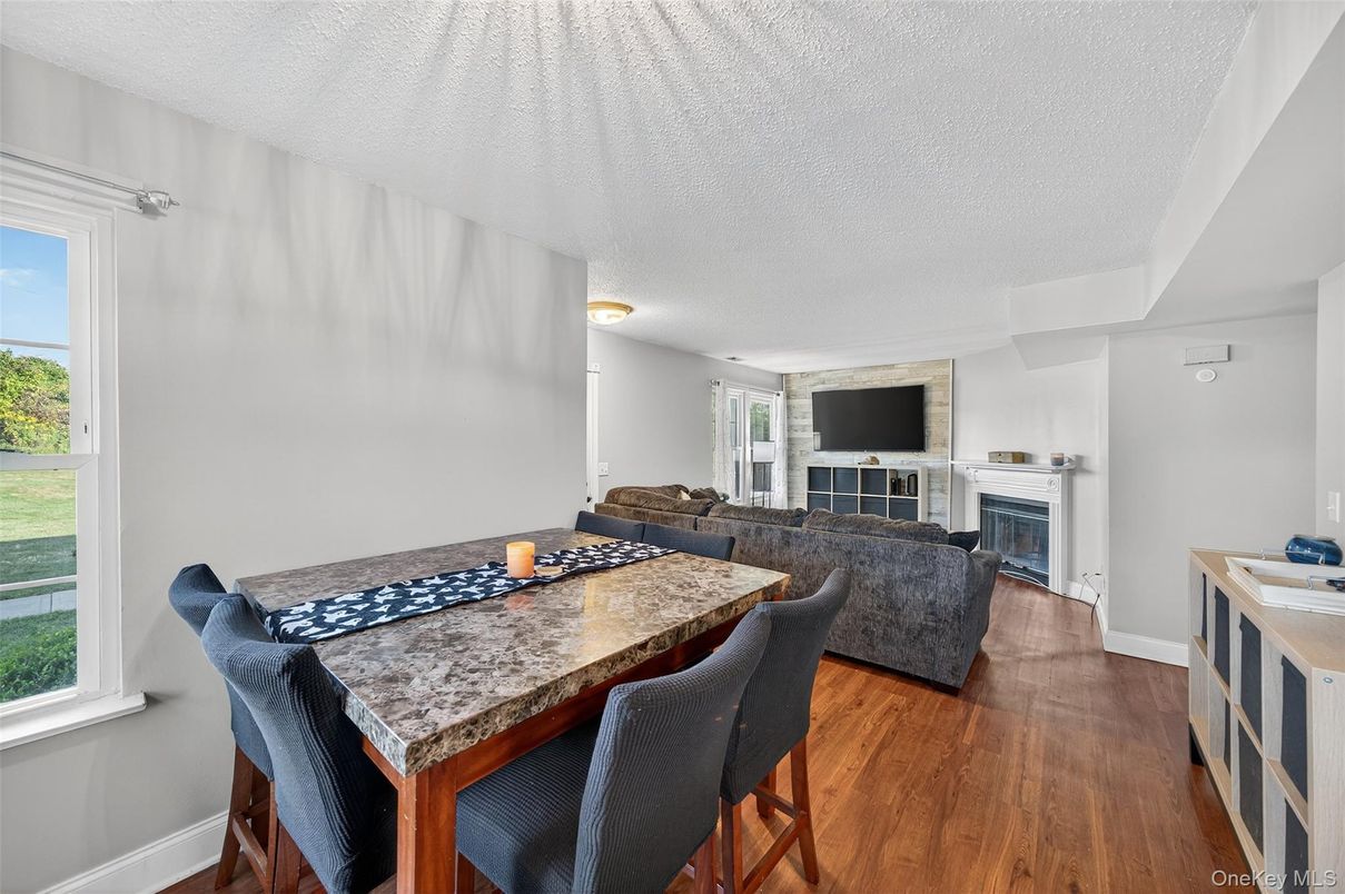 Dining room, Fireplace, Interior, Living room, Wood Texture Flooring