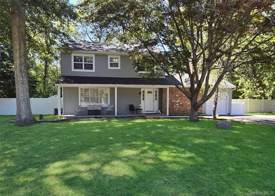 Attached, Backyard, Exterior, Facade, Brick Facade, Split Level