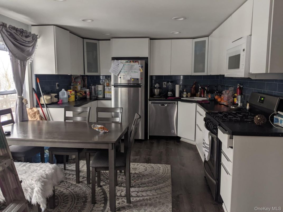 Dining room, Interior, Kitchen, Recessed Lighting, Stainless Steel Appliances, Wood Texture Flooring