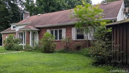 Exterior, Facade, Brick Facade, Cape Cod