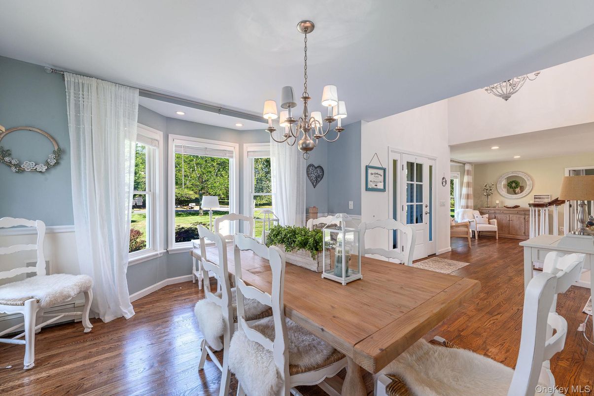 Chandelier, Dining room, Fireplace, Interior, Recessed Lighting, Wood Texture Flooring