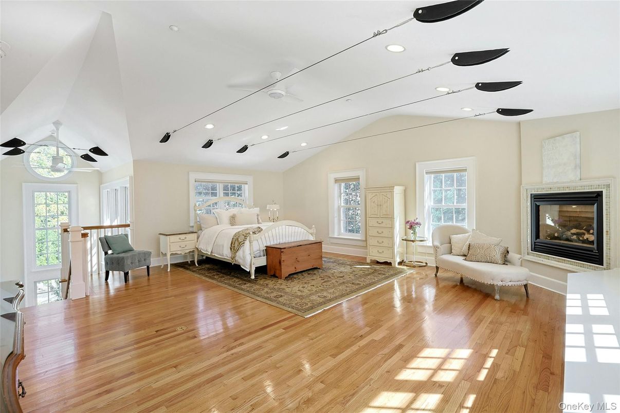 Bedroom, Fireplace, Interior, Recessed Lighting, Wood Texture Flooring