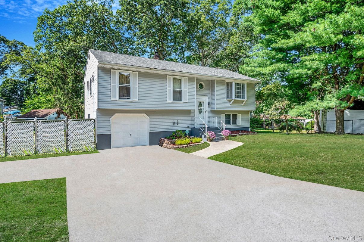 Attached, Backyard, Exterior, Facade, Raised Ranch