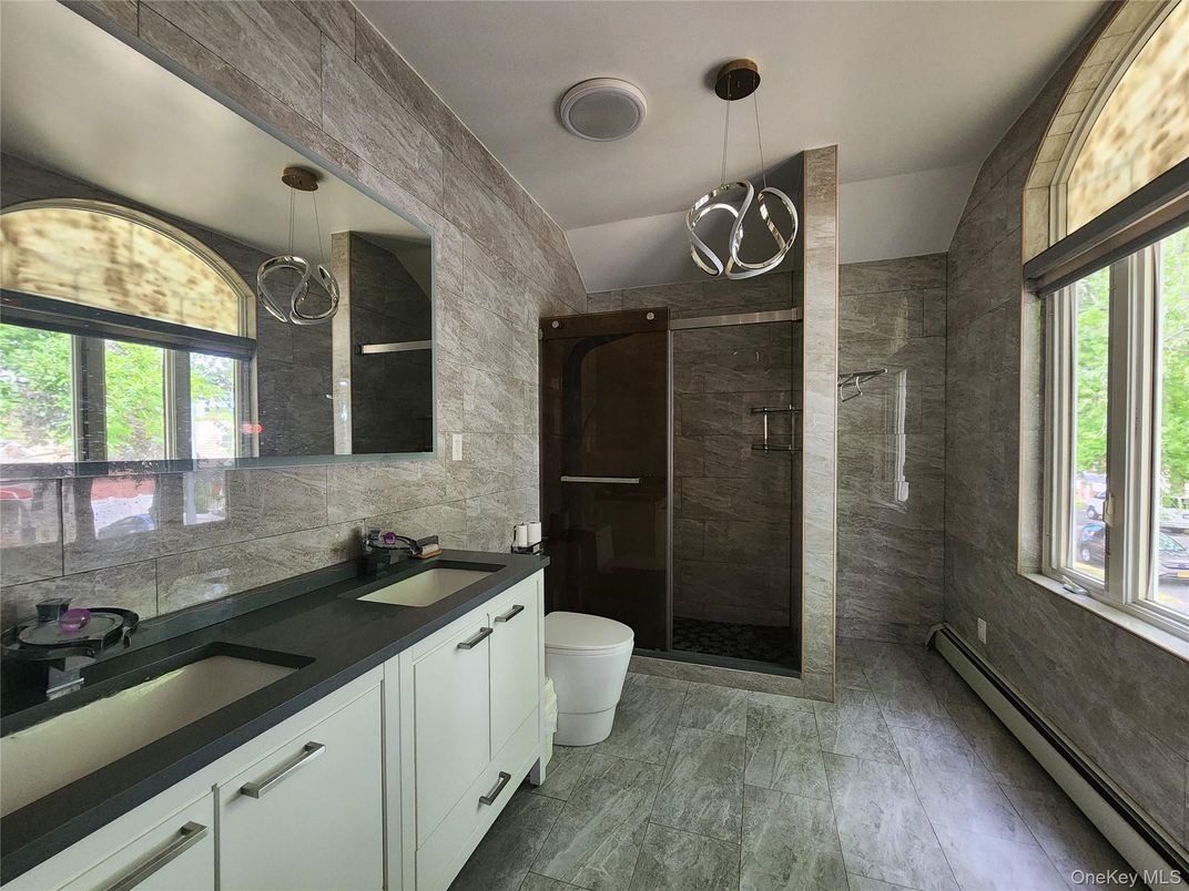 Bathroom, Dual Sink Vanities, Glass Shower, Interior, Pendant Lights