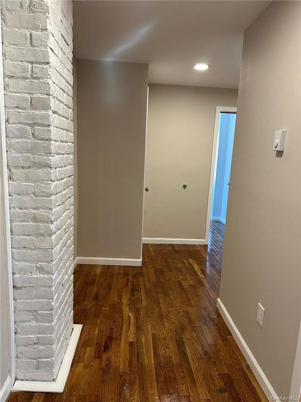 Empty room, Interior, Recessed Lighting, Stone Walls, Wood Texture Flooring