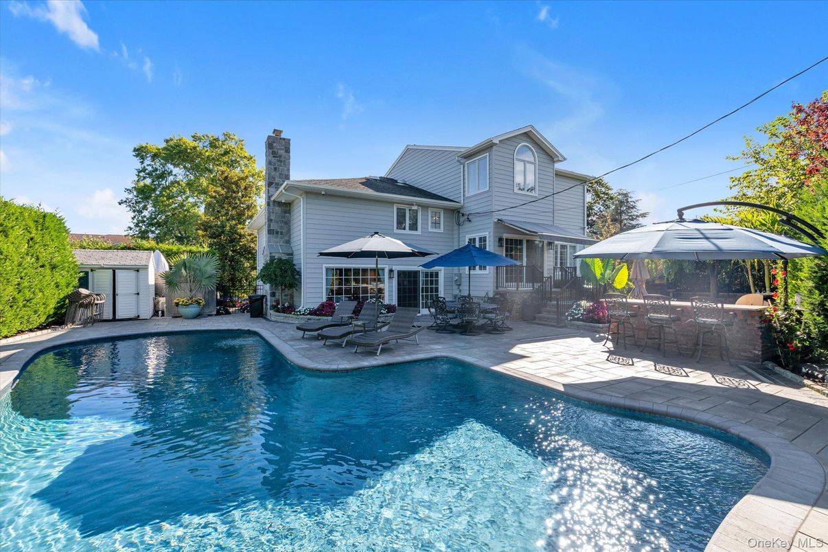 Exterior, Pool, Solar Panels