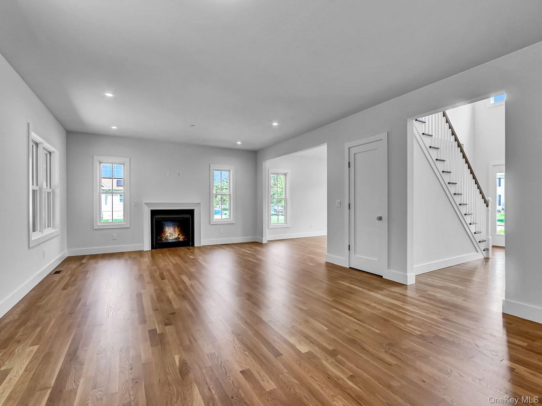 Empty room, Fireplace, Interior, Recessed Lighting, Wood Texture Flooring