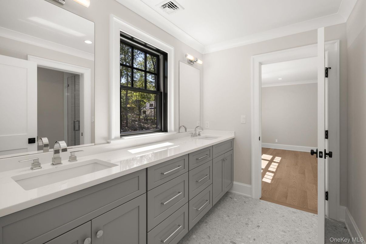 Bathroom, Dual Sink Vanities, Interior, Recessed Lighting, Wood Texture Flooring