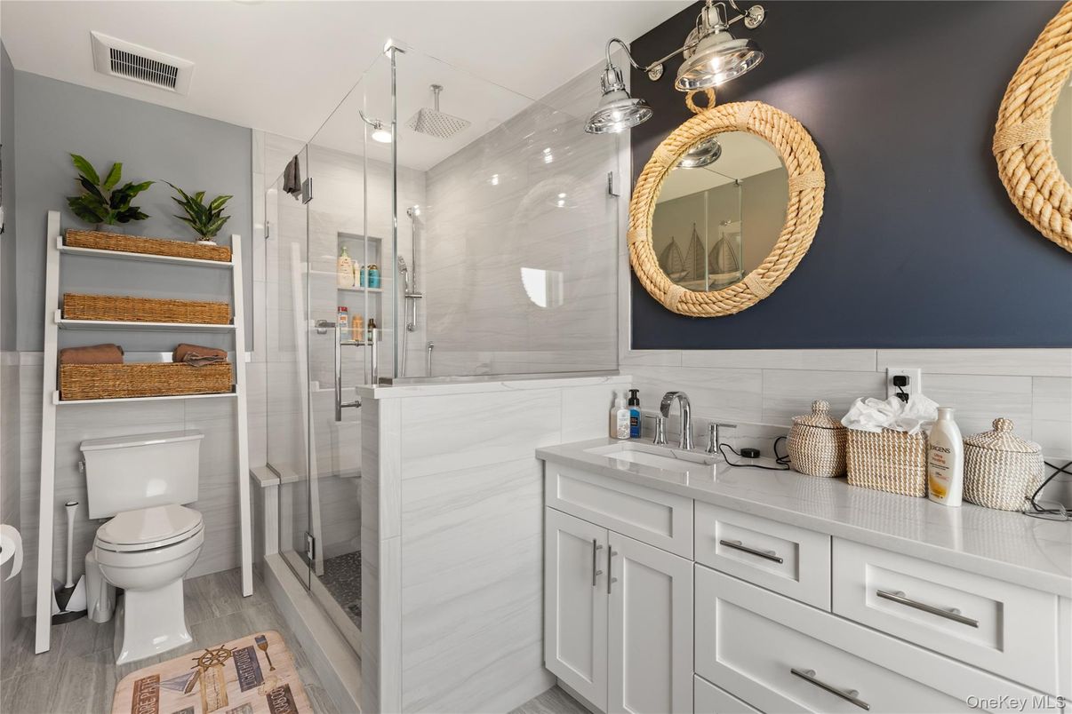 Bathroom, Dual Sink Vanities, Glass Shower, Interior, Wood Texture Flooring
