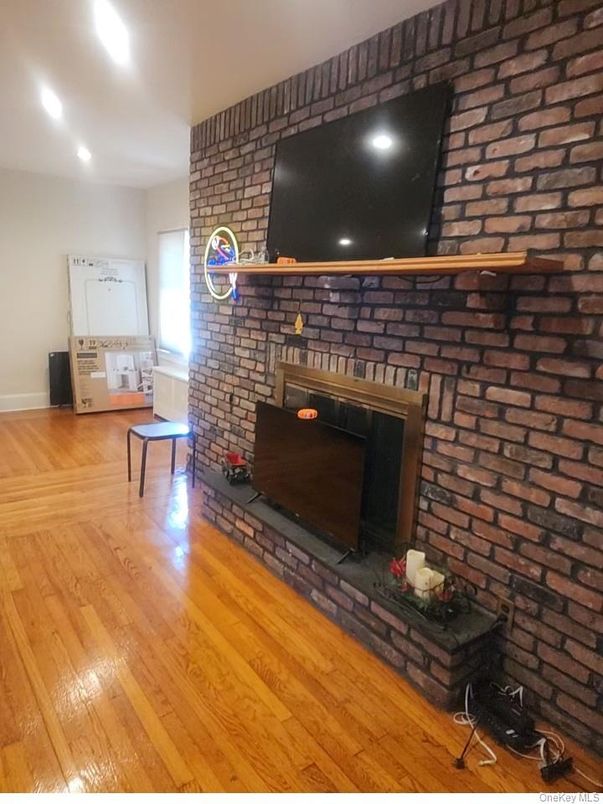 Fireplace, Interior, Recessed Lighting, Stone Walls, Wood Texture Flooring
