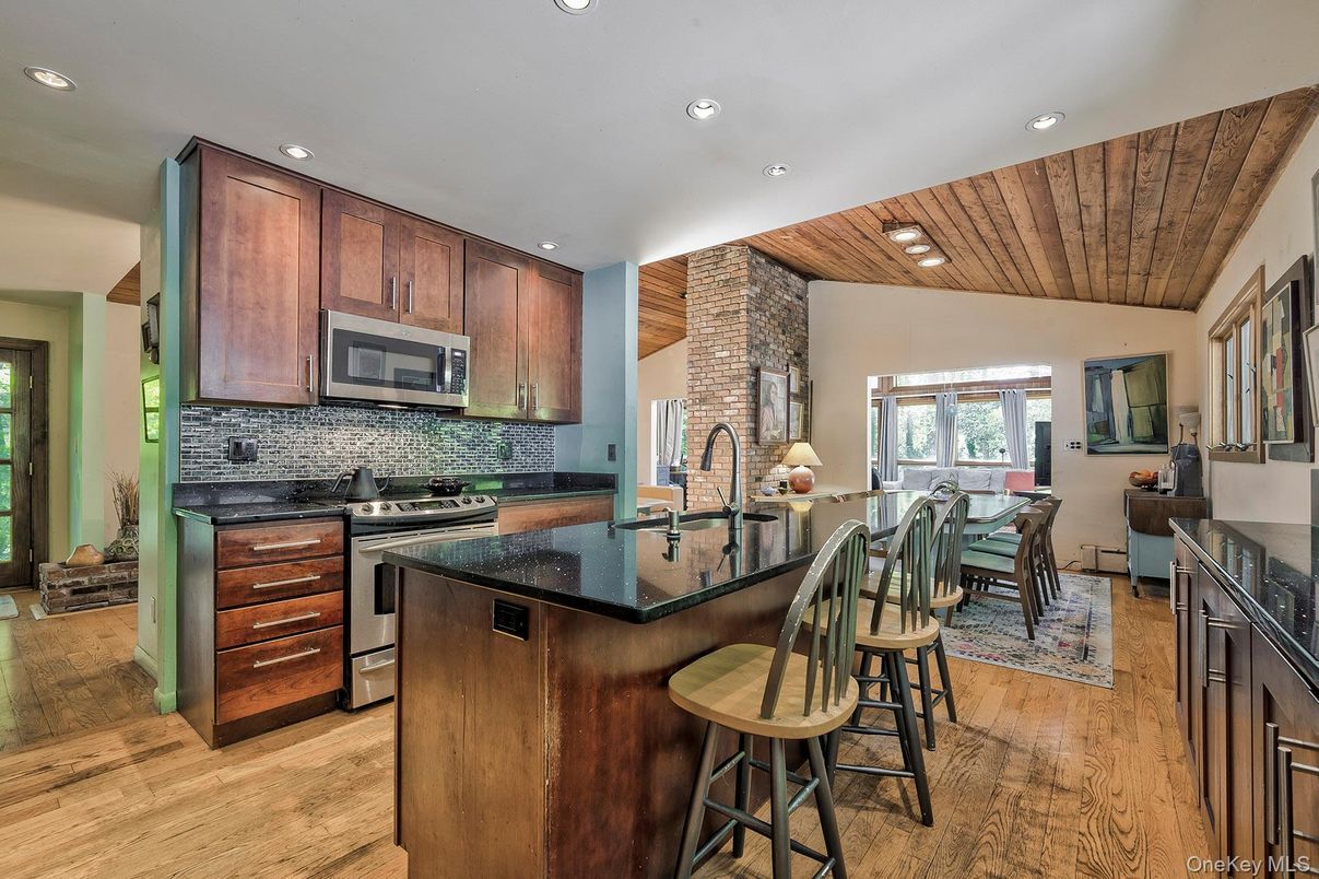 Dining room, Interior, Kitchen, Recessed Lighting, Stainless Steel Appliances, Wooden Ceilings, Wood Texture Flooring